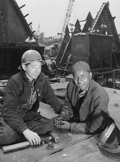 Archive photograph of a shipyard worker